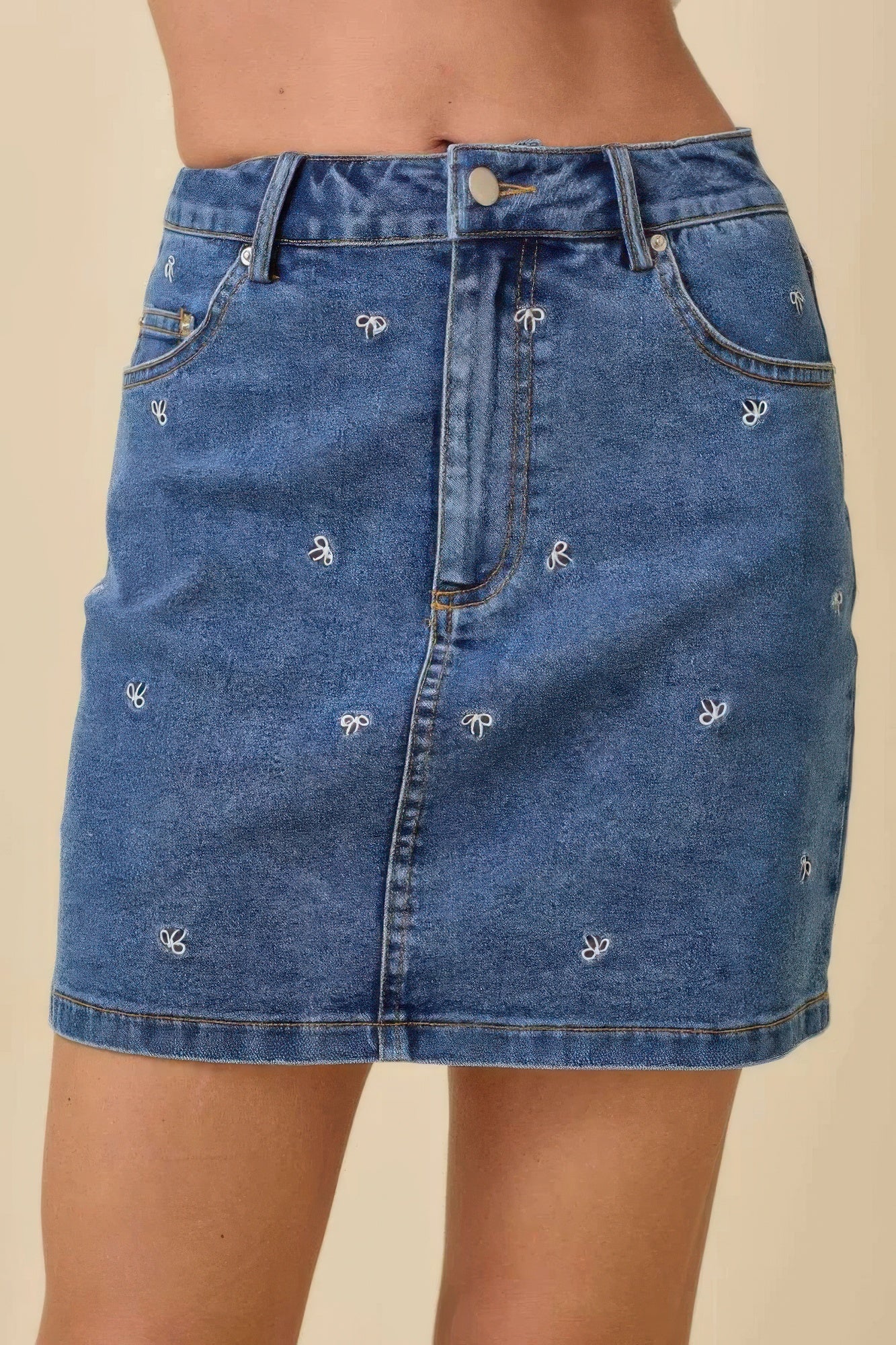 Mini Denim Skirt With All Over Ribbon Bow          
