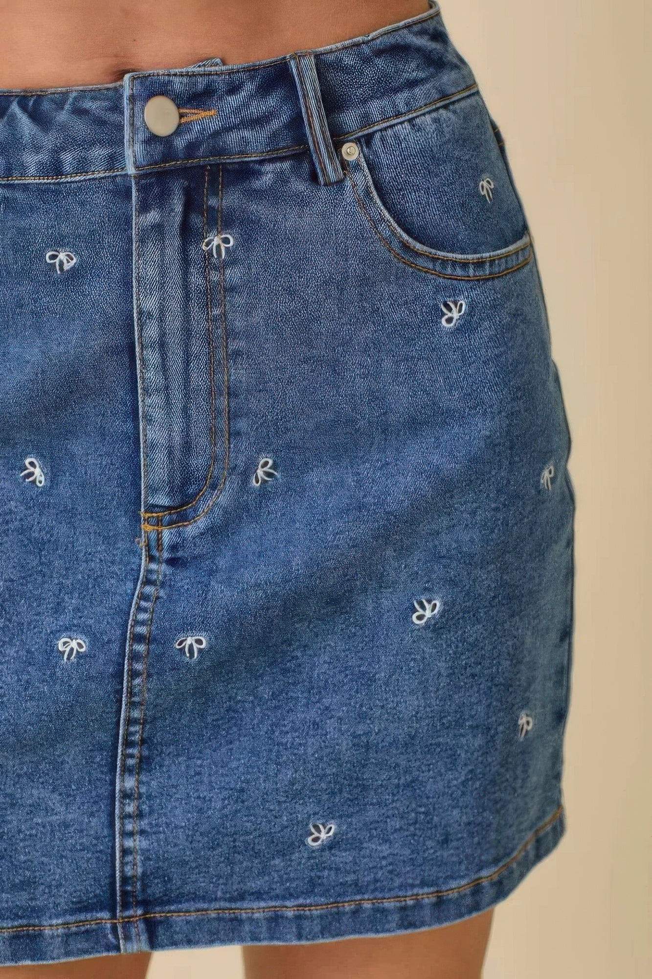 Mini Denim Skirt With All Over Ribbon Bow          