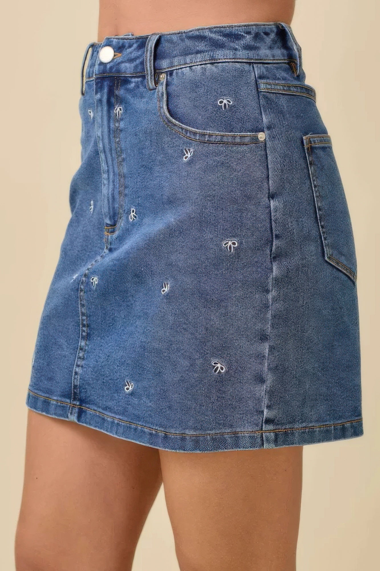 Mini Denim Skirt With All Over Ribbon Bow          