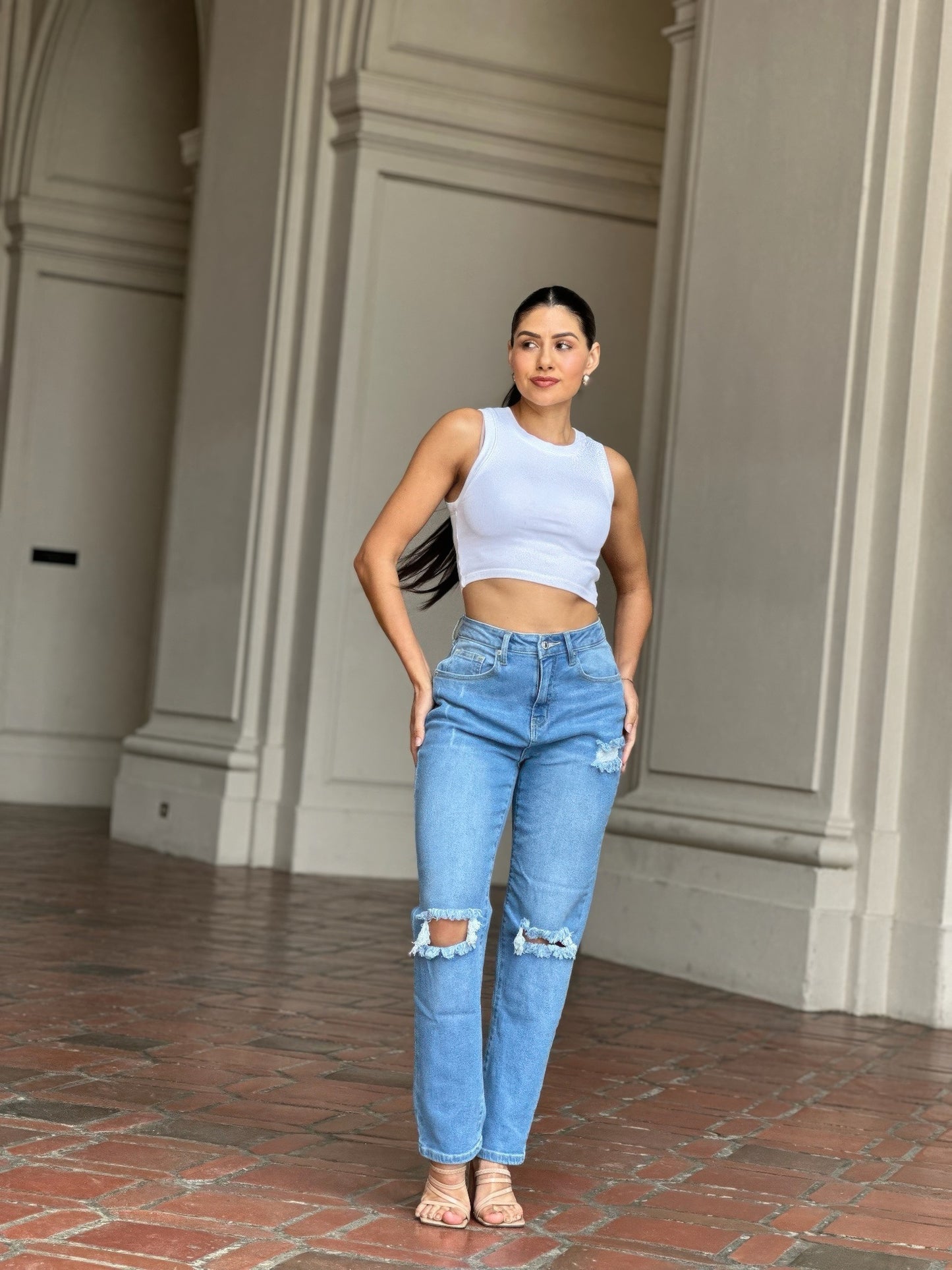 Medium Wash High Rise Jeans With Distress And Rips         