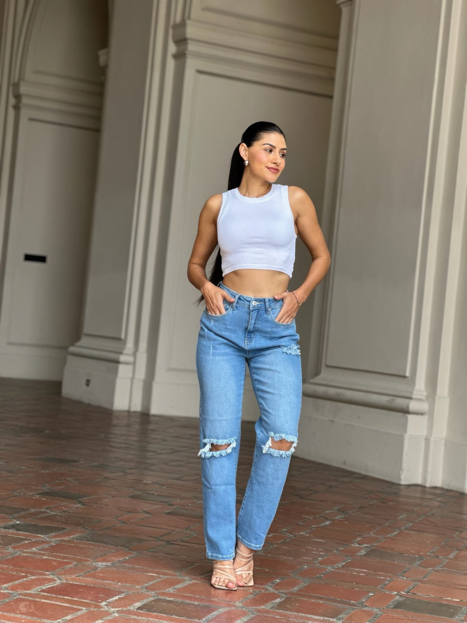 Medium Wash High Rise Jeans With Distress And Rips         