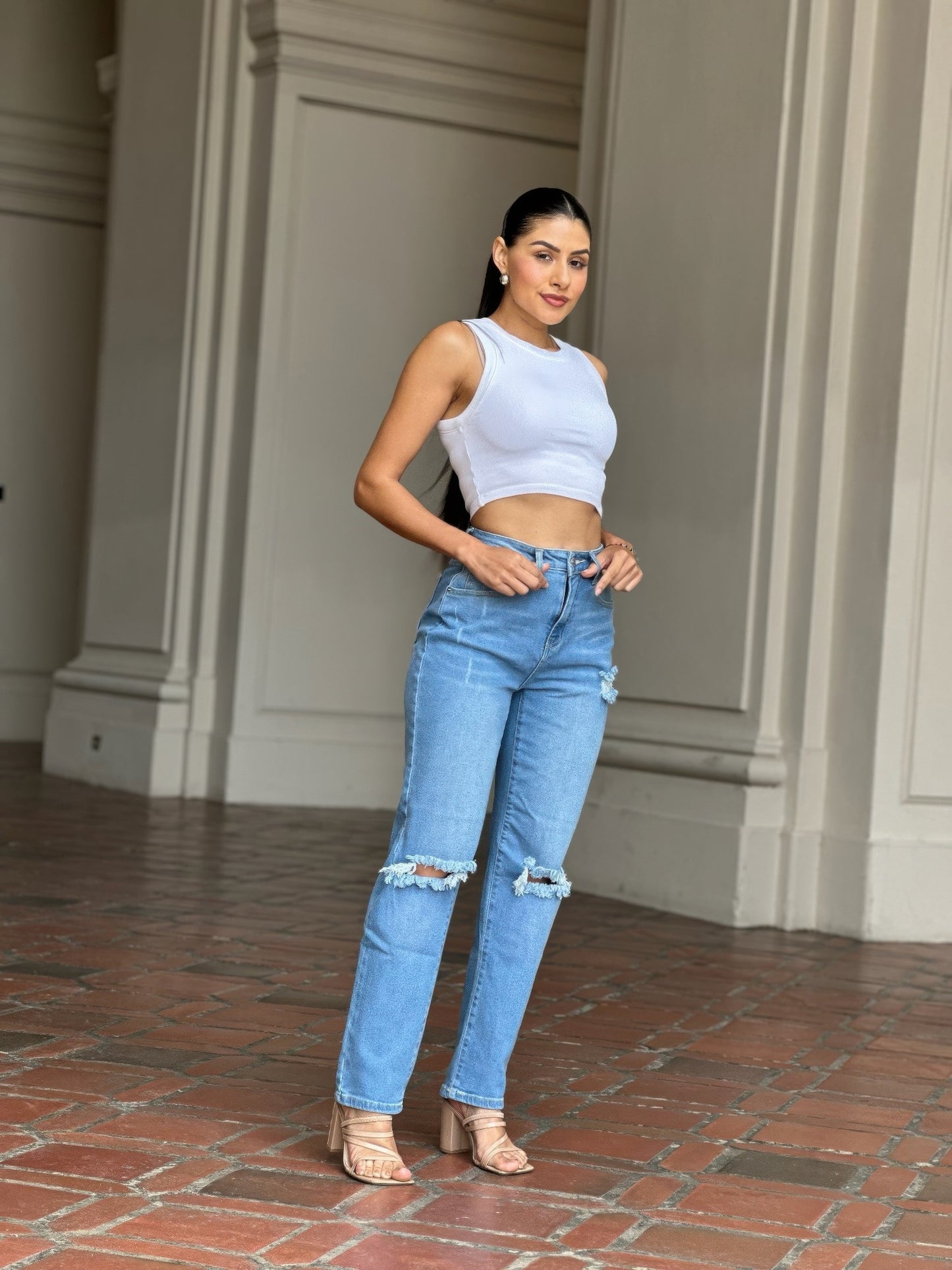 Medium Wash High Rise Jeans With Distress And Rips         