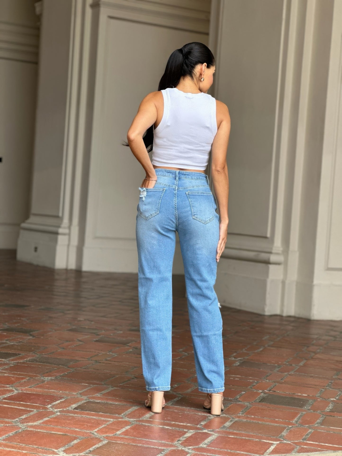 Medium Wash High Rise Jeans With Distress And Rips         
