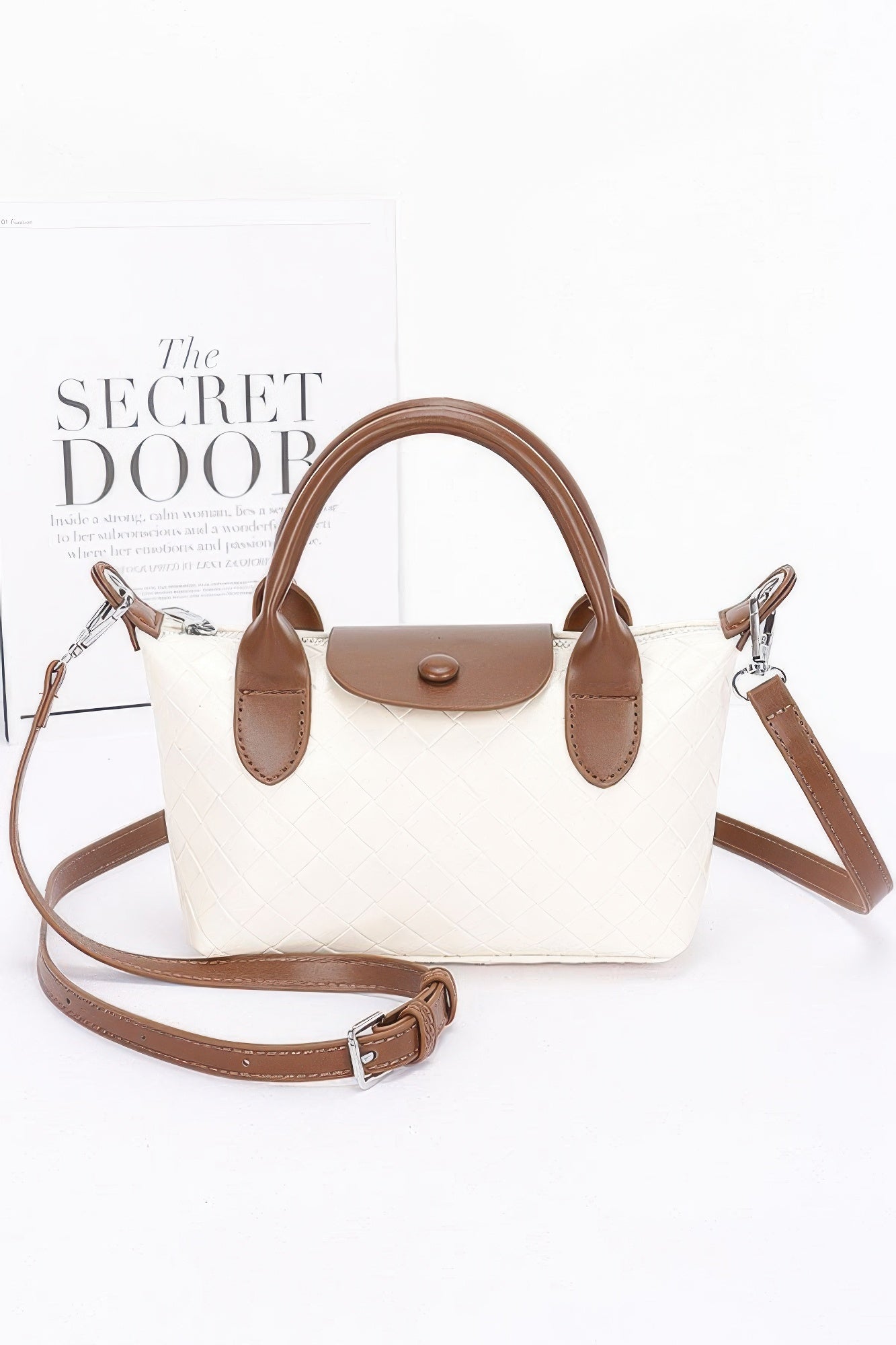 Embossed Faux Leather Top Handle Clutch