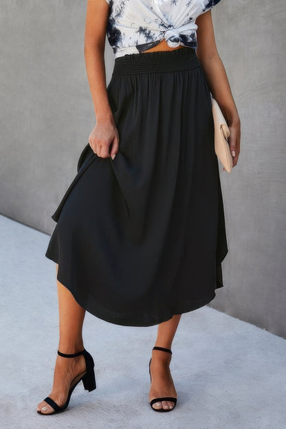 Solid Shirred Waist Asymmetrical Hem Flared Skirt