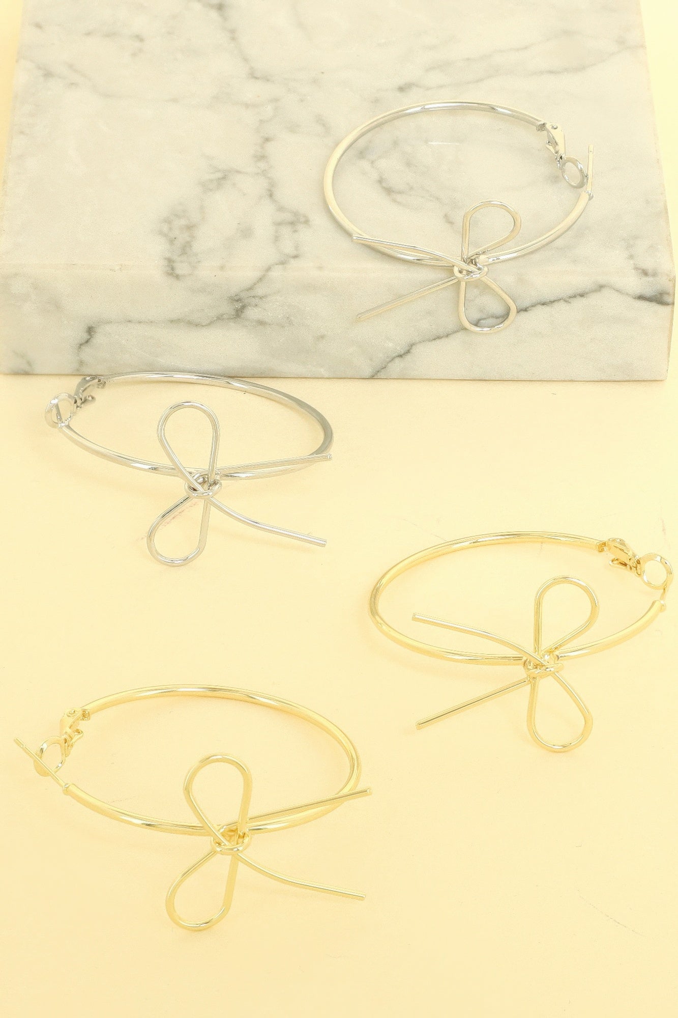 Polished Long Tail Bow Hoop Earrings
