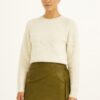 Faux Leather Strap Mini Skirt – Cross-Strap Detail
