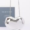 Heart-Shaped Acrylic Case Bag – Metal-Accent Clutch