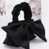 Nylon Top-Handle Clutch with Bow Front Accent