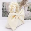 Nylon Top-Handle Clutch with Bow Front Accent