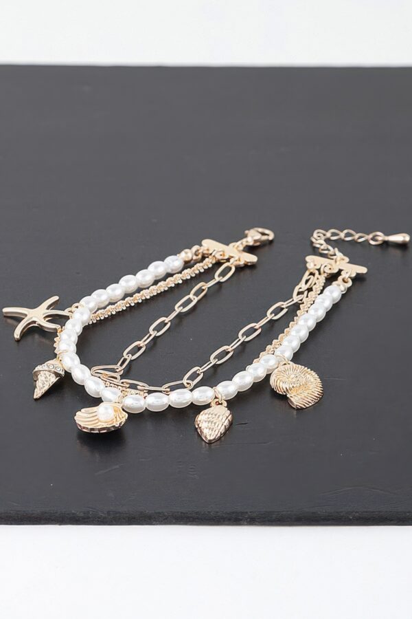 At The Beach Multi Charm Bracelet – Gold Finish with Cream Charms