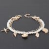 At The Beach Multi Charm Bracelet – Gold Finish with Cream Charms