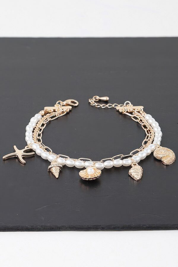 At The Beach Multi Charm Bracelet – Gold Finish with Cream Charms