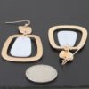 Stone Frame Drop Earrings – Geometric Metal with White Stone