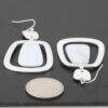 Stone Frame Drop Earrings – Geometric Metal with White Stone