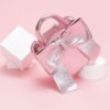 Metallic Bow Top Handle Clutch – Light Pink