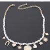 Beaded Necklace with Multi Shiny Charms – Gold Cream