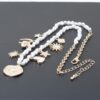 Beaded Necklace with Multi Shiny Charms – Gold Cream