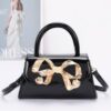 Faux Leather Top Handle Bag with Metal Ribbon Accent