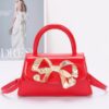 Faux Leather Top Handle Bag with Metal Ribbon Accent
