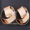 Delicate Curved Earrings – Polished Gold Alloy