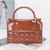 Embossed Enamel Top Handle Bag with Mixed Metal Accents