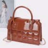 Embossed Enamel Top Handle Bag with Mixed Metal Accents