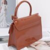 Embossed Enamel Top Handle Bag with Mixed Metal Accents