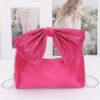 Rhinestone Bow Handle Nylon Clutch – Satin Finish