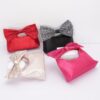 Rhinestone Bow Handle Nylon Clutch – Satin Finish