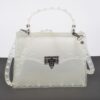 Monotone Studded Clutch – Structured Polyurethane