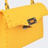 Monotone Studded Clutch – Structured Polyurethane
