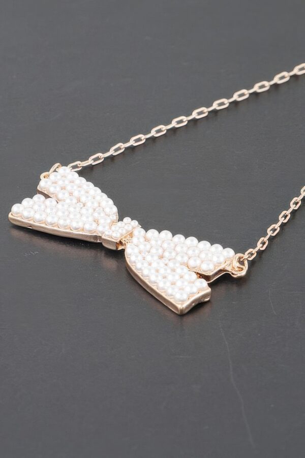 Faux Pearl Bow Necklace – Polished Bow Accent