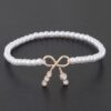 Faux Pearl Bracelet with Rhinestone Bow Accent