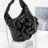 Metallic Sculptural Flower Handle Handbag