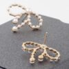 Pearl Ribbon Stud Earrings – Looped Ribbon Accent