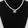 White Pearl Bow Necklace – 16″ Collarbone Chain