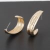 Hammered Abstract Leaf Earrings – Polished Metallic