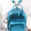 Compact Metallic Backpack with Glossy Finish