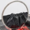 Sculptural Round Stone-Handle Evening Clutch