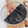Sculptural Round Stone-Handle Evening Clutch
