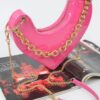 Heart-Shaped Clutch with Oversized Handle