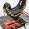 Heart-Shaped Clutch with Oversized Handle