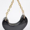 Heart-Shaped Clutch with Oversized Handle