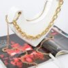 Heart-Shaped Clutch with Oversized Handle