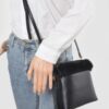 Compact Faux Leather Bag with Fur Top Handle