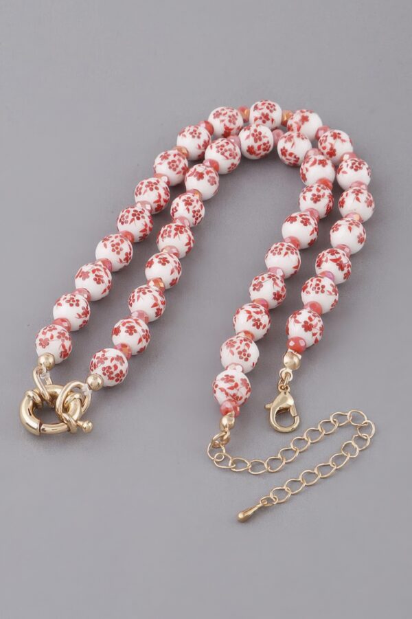 Flower Beaded Necklace with Textured Floral Accent