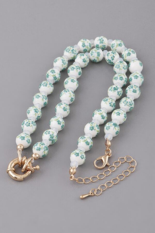 Flower Beaded Necklace with Textured Floral Accent