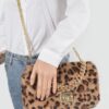 Faux Leo Fur Shoulder Bag with Mixed Metal Accents