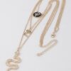 Triple Snake Pendant Necklace – Sculptural Accent